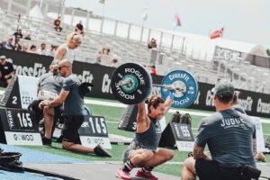 Invictus Masters Athlete, Jenn Ryan, snatches in the Olympic Total event at the 2022 CrossFit Games.
